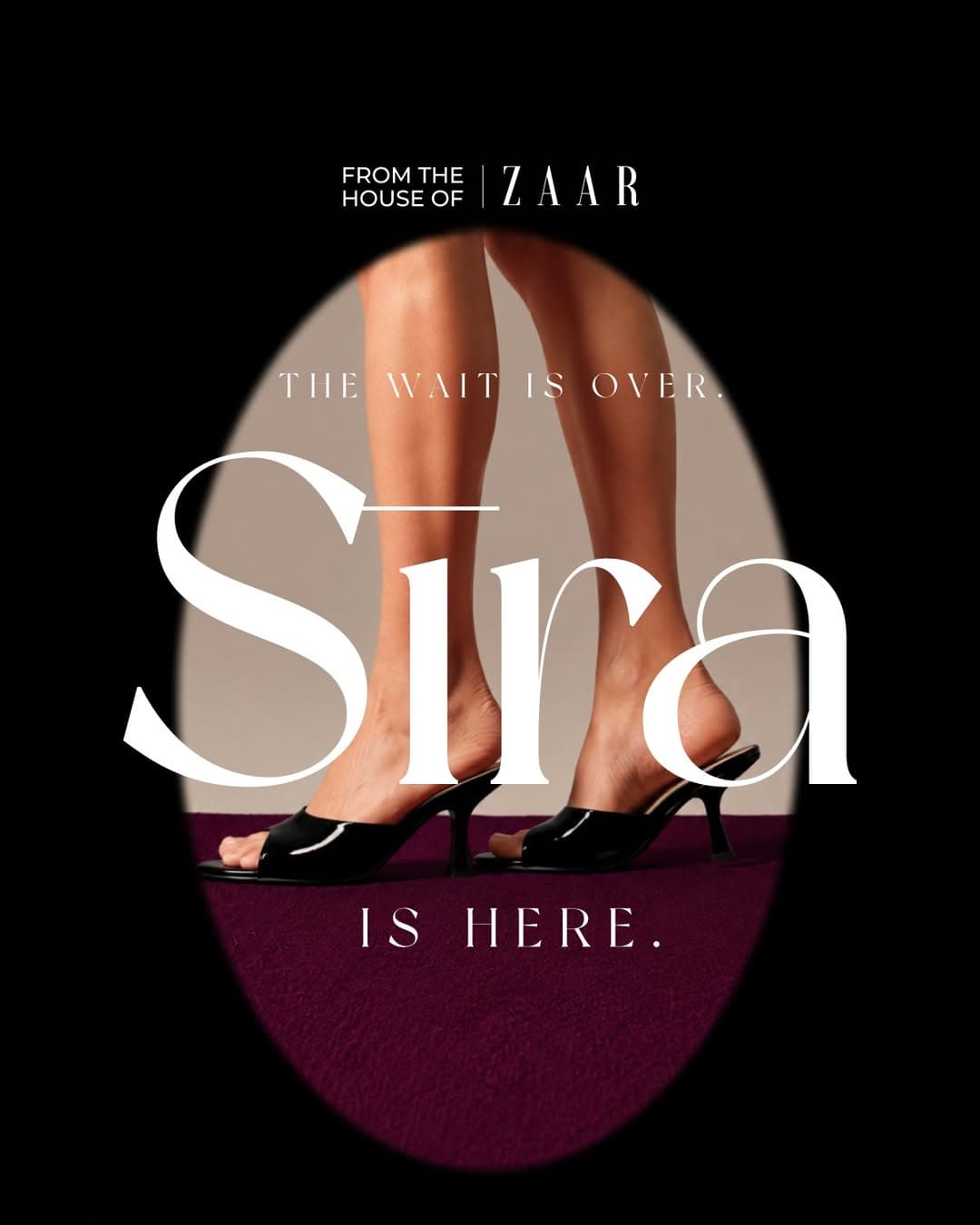 Sira black patent mules on a plum floor, captioned the wait is over.