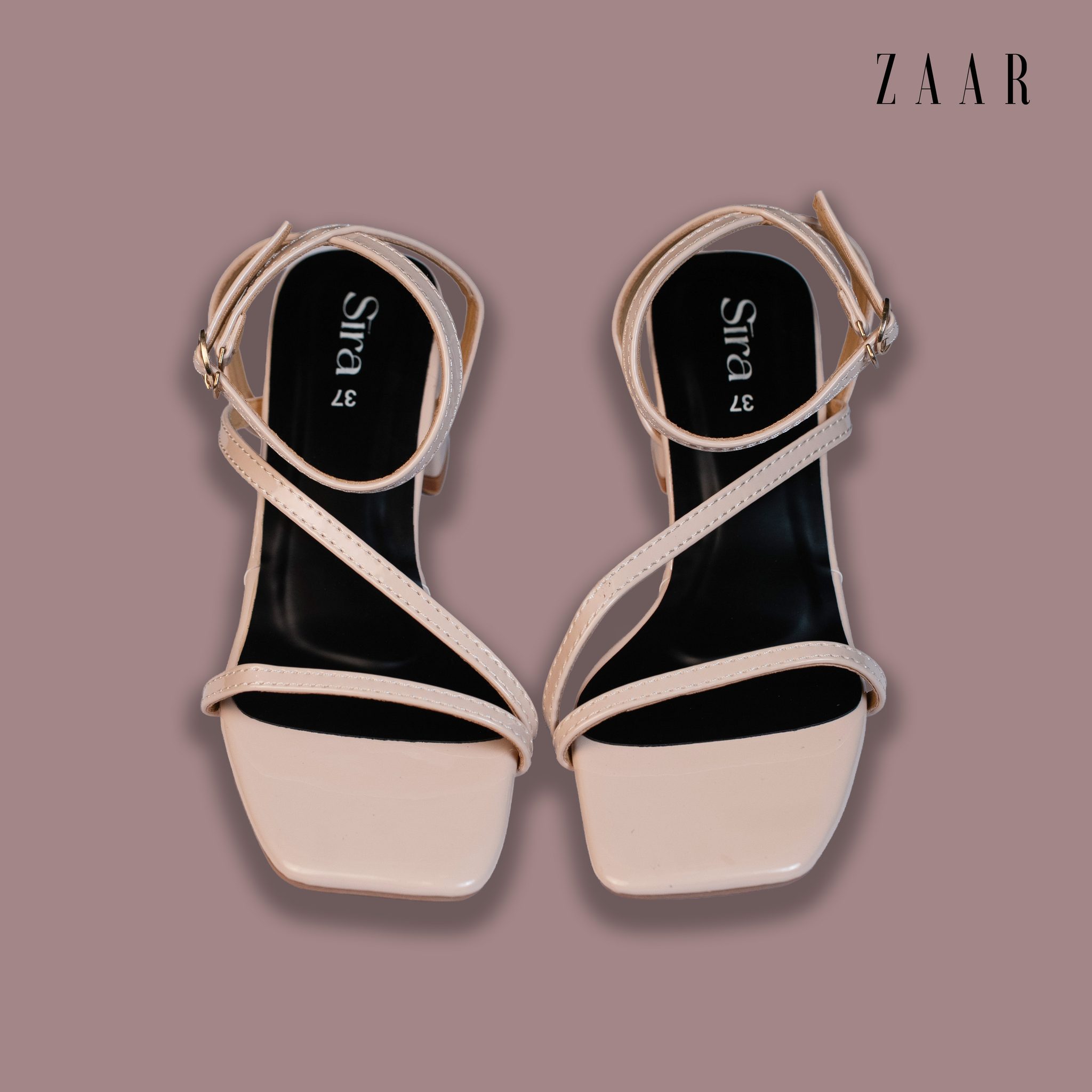 A pair of Sira nude strappy block-heel sandals, seen from above.